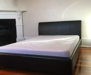 Leather look queen bed with mattress delivery available