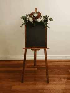 Striking Rustic Chalkboard with Flowers For Hire