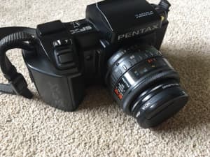 Pentax SFX auto focus film camera plus three lenses and flash