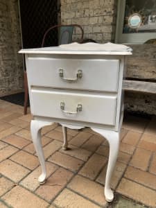 Ornate side table with drawers