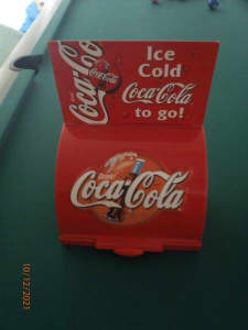 Coca cola straw holder.