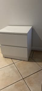 Two white bedside tables