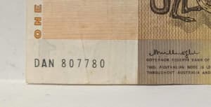 Old Australian paper $1 banknote with the name prefix "DAN"