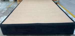 Almost new Black fabric queen bed base only.Pick up or deliver