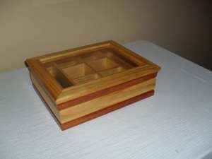 BEAUTIFULLY GRAFTED TIMBER TEA-BAG STORAGE CONTAINER.