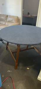 Outdoor picnic table with cloth covering