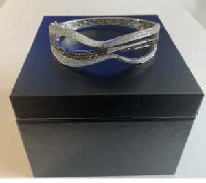 Valued $15,000 18k 3.71 carat black and white diamond bangle bracelet