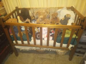 old fashioned wooden cot (doll display)