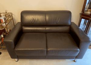 Two Brown Leather Sofas