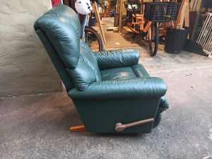 Green leather lazy boy rocking and reclining chair