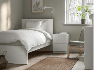 Sleek modern white timber single bed frame (near new) with mattress