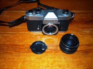 Yashica TL Electro SLR film camera with lens