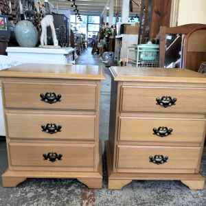 Pair of timber bedside tables. See details. 
