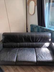 Free 3 seater black leather couch. 