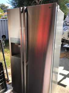 Free lg side by side fridge not cooling