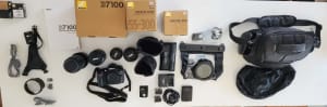 Nikon D7100 DSLR Camera with heaps of accessories and lenses