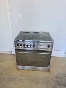 Stainless Steel Gas Stove with hinged glass top. 