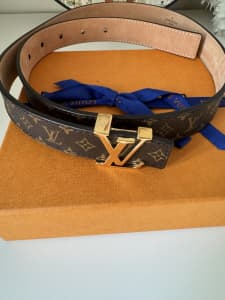 Brand new Louis Vuitton belt with original dust bag and receipt