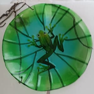 Green glass hanging bird feeder