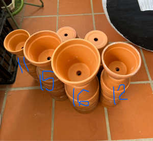 Medium and small terracotta garden pots planters