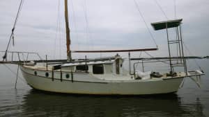 Sailing BOAT.OLD classic yacht. timber works inside and mast boom