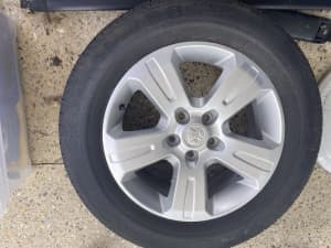 Car tyre with rim to suit a Captiva