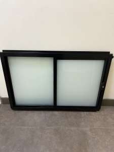 600Hx910W black aluminium sliding window: located in Wetherill Park
