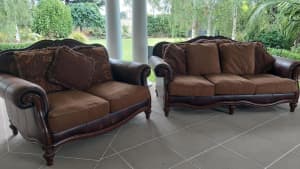 2 seater & 3 seater sofa with brown leather & dark timber