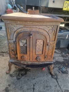 Cast iron combustion heater antique 