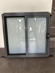Woodland grey 600H x 610W sliding window: located in Wetherill Park