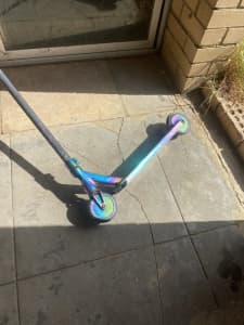 Custom oil slick wheels, clamp and scooter deck. From scooter hut