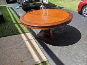 Large round solid timber wooden table, and 6 chairs.