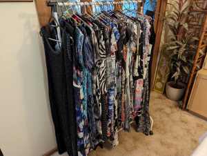 Bulk sale of 33 dresses and 18 tops, vests and Cardigans.