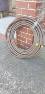 Coil of 23mm diameter copper pipe never unrolled