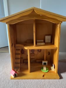 Good quality wooden dolls house