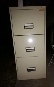 Filing cabinet and over 50 files FREE