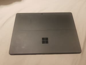 Matte Black Surface Go 3 (i3, 128GB, 8GB RAM) with full accessories.
