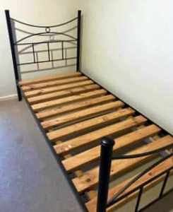 black metal single bed and mattress, $140