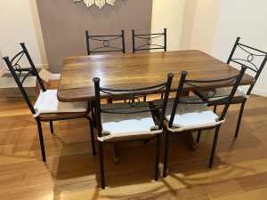 SOLID TIMBER TABLE AND SIX CHAIRS