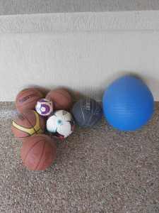 Basketballs, soccer ball and yoga ball