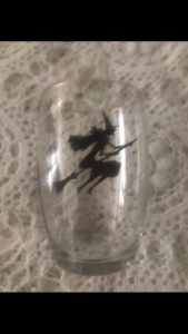 Witch on a broomstick glass