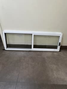 White aluminium sliding window 400Hx1210W clear glass