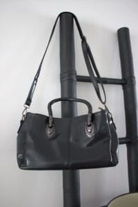 Black handbag with detachable shoulder strap