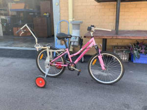 Pink and black bicycle 