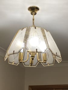 Pendant light in gold plated finish