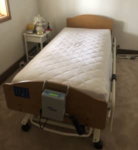 Invacare electric adjustable bed with mattress 
