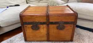 Vintage wooden steamer trunk, metal clasps and leather handles