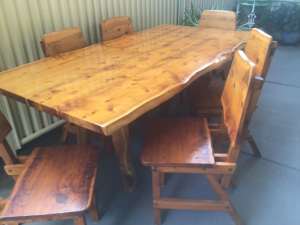 Wooden outdoor setting comprising of table & 6 chairs