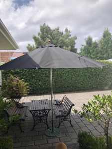 Outdoor umbrella up and weather protection