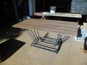 Rustic garden table , wrought iron base , jarrah top